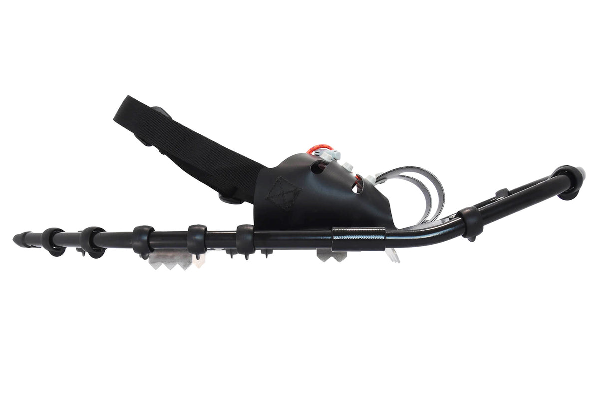 Side view of ultralight race snowshoes showing aluminum frame and bindings
