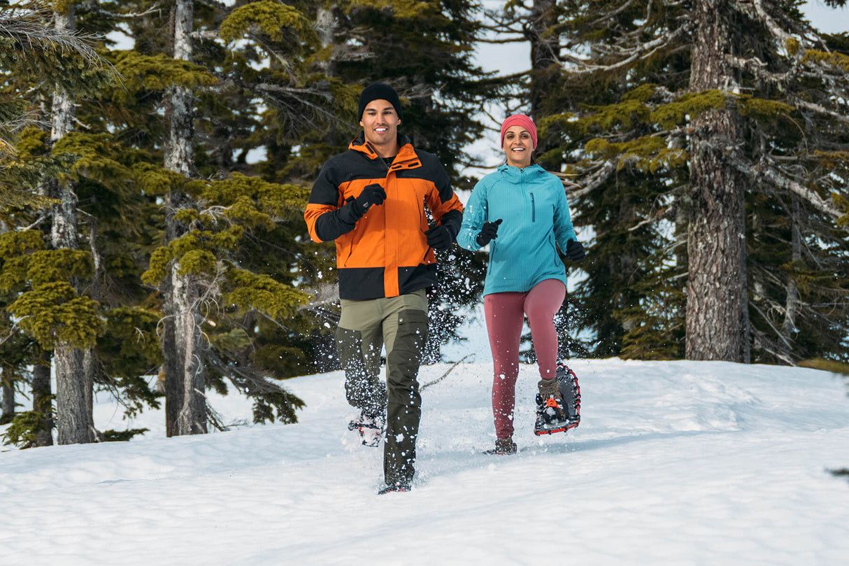 Elite Race snowshoes in action on snowy trail during winter competition