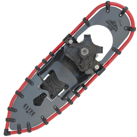 Side view of red Women’s Elite 25 snowshoes with bindings and crampons